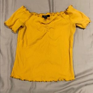 Off the shoulder yellowish shirt
